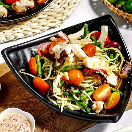 Hình ảnh Mực dầm đu đủ ba khía kiểu Thái