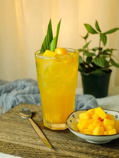 Hình ảnh trà tắc cam xoài